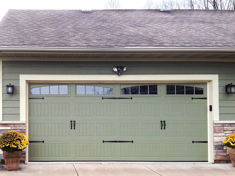 Why Adding Decorative Accessories to Residential Garage Doors?